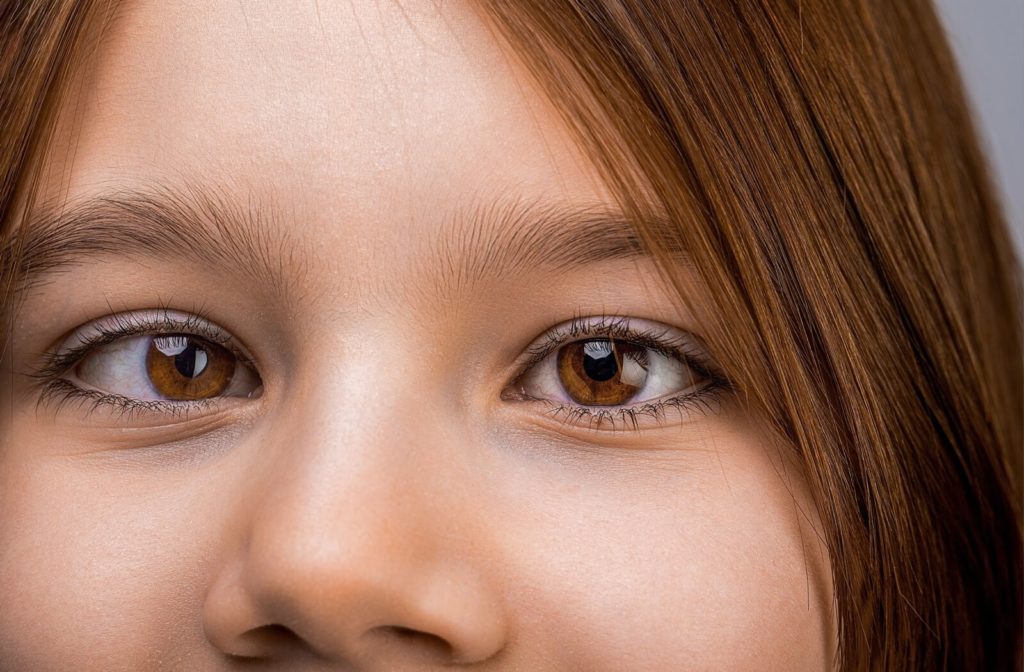 Close-up of a female child's crossed eyes