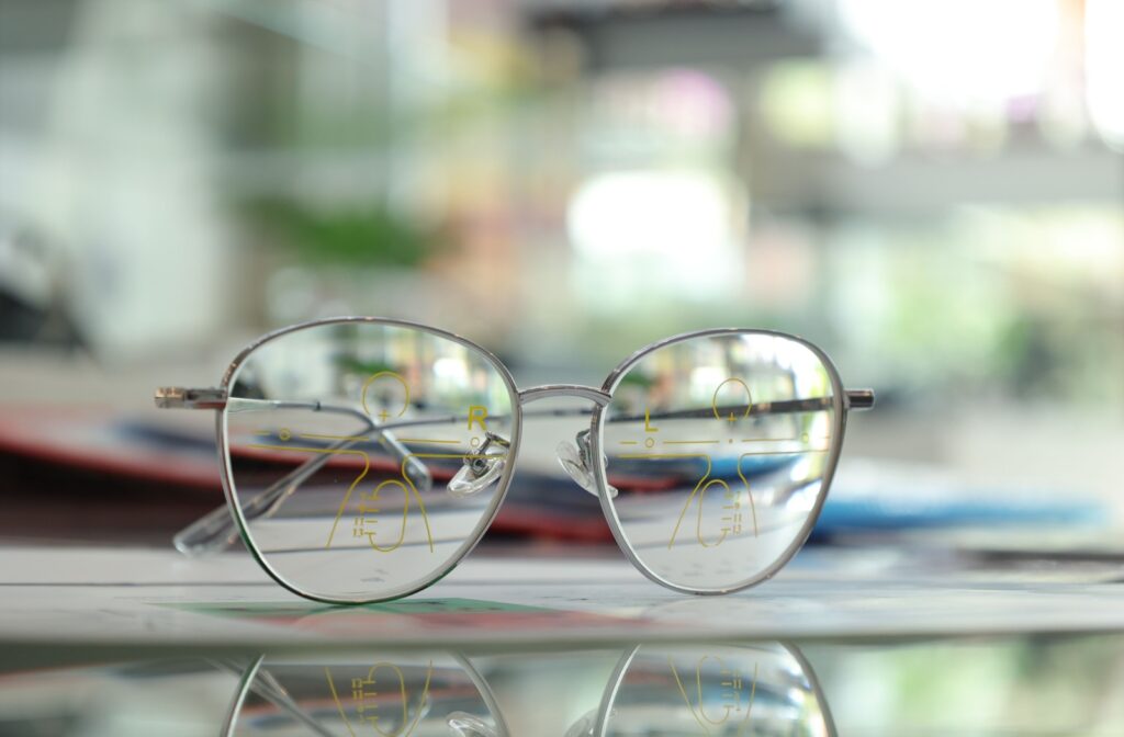 Glasses with progressive lens markings on them.